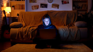 teen boy on computer