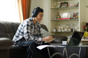 teen on computer telehealth session