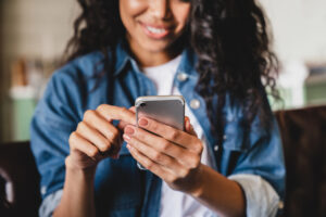 teen on mobile phone social media